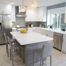 Modern White Kitchen with White Cabinets and Countertops 
