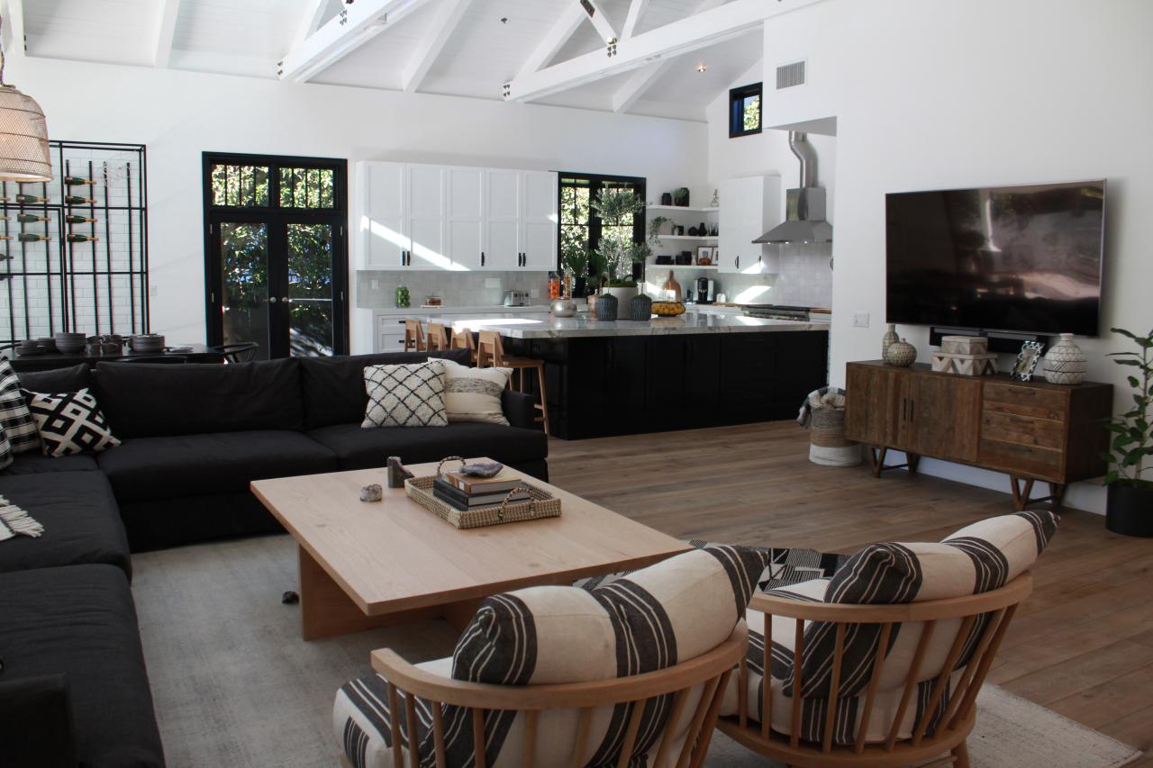 Rustic Neutral Living Room With A Brown Coffee Table And Chairs Hgtv