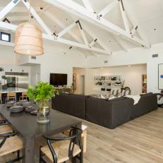 Neutral Rustic Dining Room with White Exposed Beams 