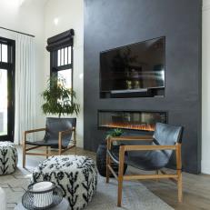Modern Black and White Master Bedroom with Black Chairs 