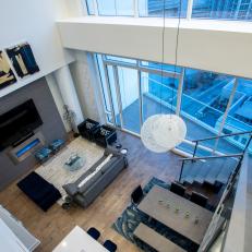 Modern Apartment With High Ceilings and Wall of Windows