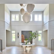 Neutral, Contemporary Foyer with Dramatic Lighting