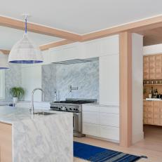 White Contemporary Kitchen with Gray Marble