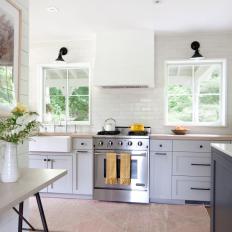 White Scandinavian Kitchen With Yellow Towels