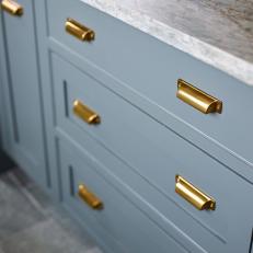 Gray Drawers With Brass Pulls