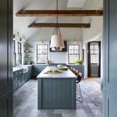 Gray Country Chef Kitchen With Reclaimed Beams