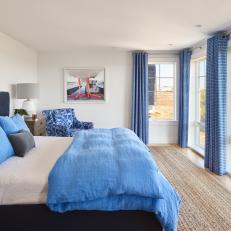 Soft Blue Accents, Plush Fabrics Create Serene Master Bedroom