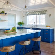 Bright Blue Kitchen Island With Rustic Wood Barstools
