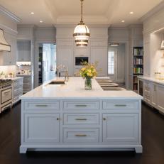 White Luxury Kitchen With Huge Island and Dual Oven