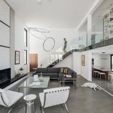 Bright, Modern Living Room Highlights Dramatic Ceiling Height