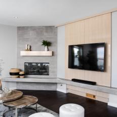 Contemporary Family Room with Fireplace and Wall Mounted TV