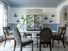Blue and White Formal Dining Room With Statement Chandelier