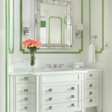 Green and White Bathroom With Pink Roses