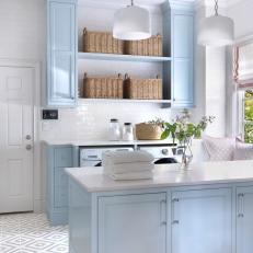 Blue and White Laundry Room With Baskets