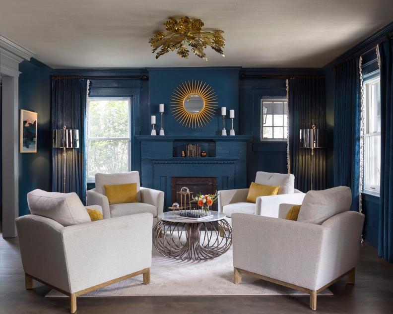 Blue Living Room With Sun Mirror