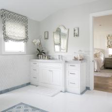 White Master Bathroom With Gray Shades