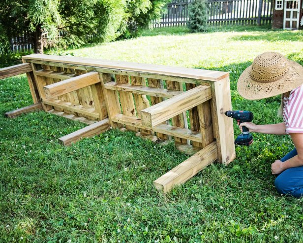 Construct a sturdy barrel stand out of an outdoor-friendly wood such as cedar.