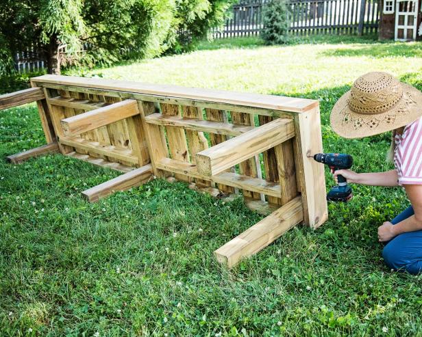 Construct a sturdy barrel stand out of an outdoor-friendly wood such as cedar.