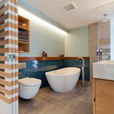 Modern Master Bath with Blue Ceramic Tiles and Soaking Tub