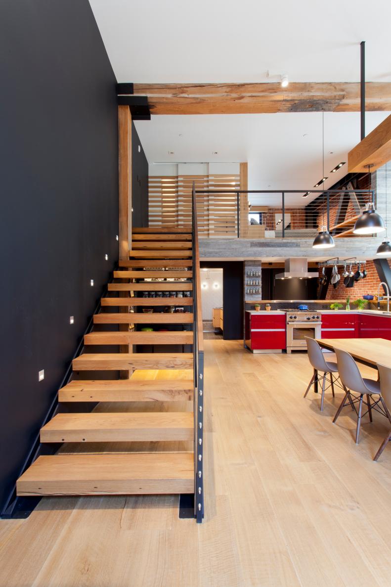 Loft with Exposed Beams and Stairwell with Open Risers
