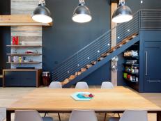 Modern Loft Dining Area with Oak Table and Eames Chairs