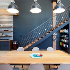 Modern Loft Dining Area with Oak Table and Eames Chairs