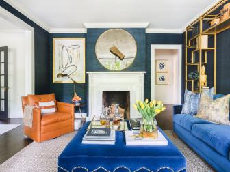 Living Room with Blue Wall, Couch and Upholstered Table