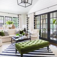 Living Room with Shiplap Walls and Black and White Striped Rug