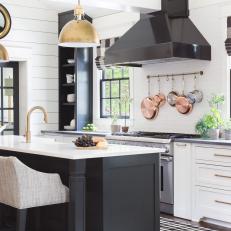 Black and White Kitchen with Island and Open Shelving