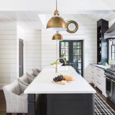 Black and White Kitchen with Brass Pendant Lights