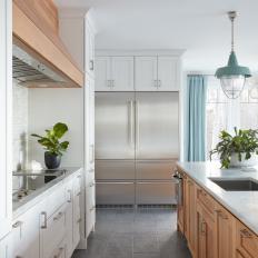 Transitional Chef Kitchen With Blue Pendant