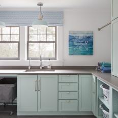 Laundry with Seaglass Blue Cabinets