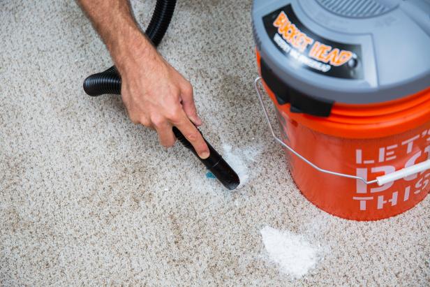 Use a vacuum to suck up the baking soda.