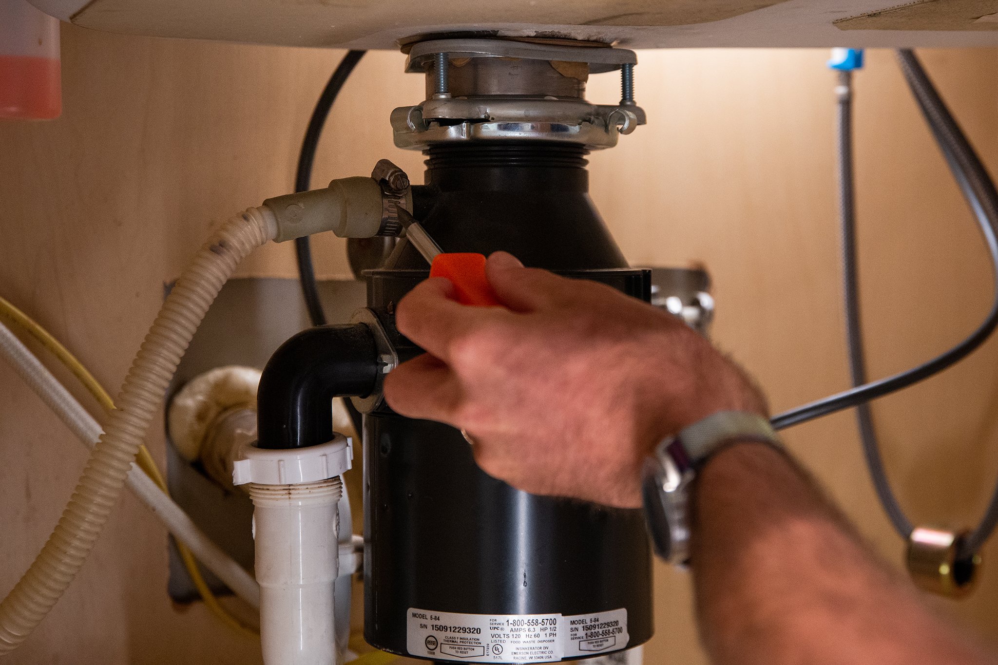 how to remove a garbage disposal permanently