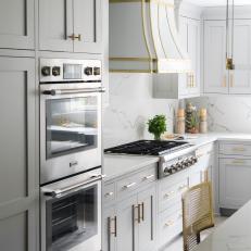 White Chef Kitchen With Gold Accents