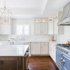 White Transitional Chef Kitchen With Blue Stove