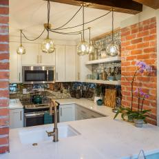 Modern Loft Condo Kitchen with Brick Walls