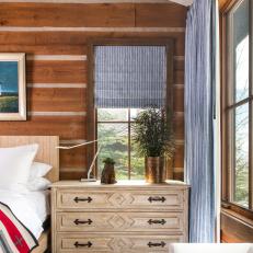 Rustic Bedroom With Striped Shade