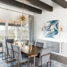 Modern Dining Room With Exposed Beam Ceiling