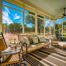 Country Screened Porch With Striped Rug