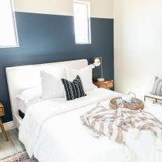 Blue and White Scandinavian Bedroom With Accent Wall