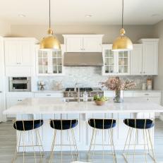 Transitional Open Plan Kitchen With Gold Pendants