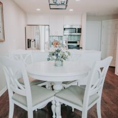 White Dining Table With Cushioned Chairs