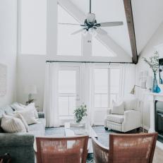 White Living Room With Vaulted Ceiling