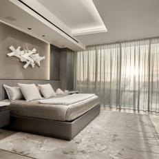 Gray Modern Master Bedroom With White Art