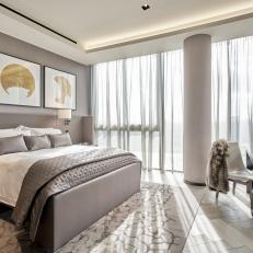 Gray Modern Bedroom With Gold Art