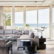 Waterfront Living Room With Gray Rug