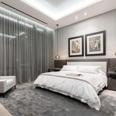 Gray Modern Bedroom With Tray Ceiling