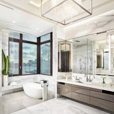 Waterfront White Spa Bathroom With Chandelier