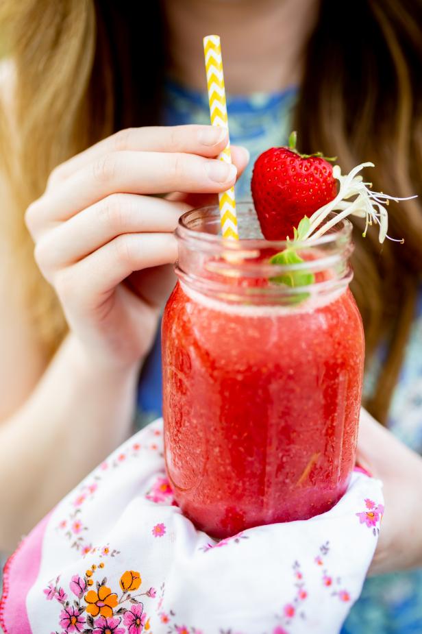 Beat the summer heat with this grown-up slushie made from mellow honeysuckle vodka and sweet, juicy strawberries.